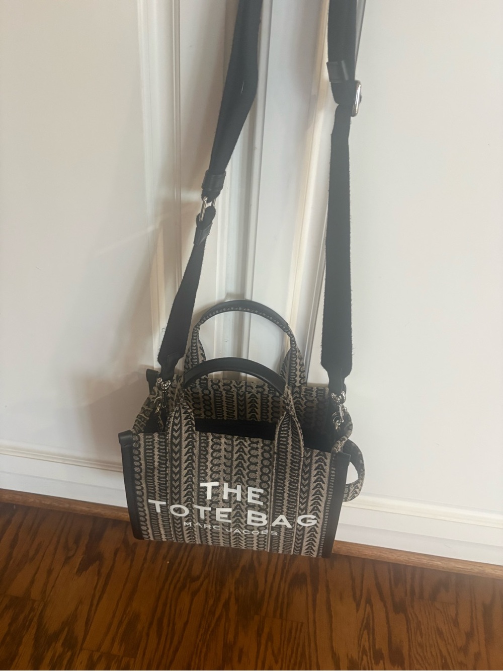 The Tote Bag Canvas Crossbody Tote in Black and Cream